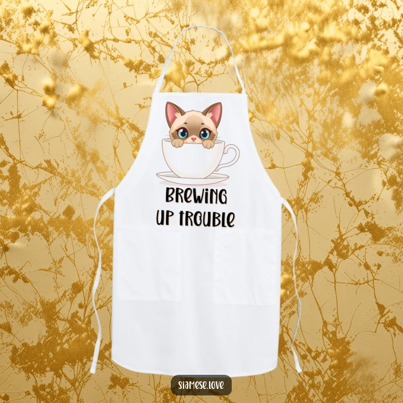 Funny apron with a curious Siamese cat peeking from behind a giant teacup, perfect for a humorous kitchen experience.