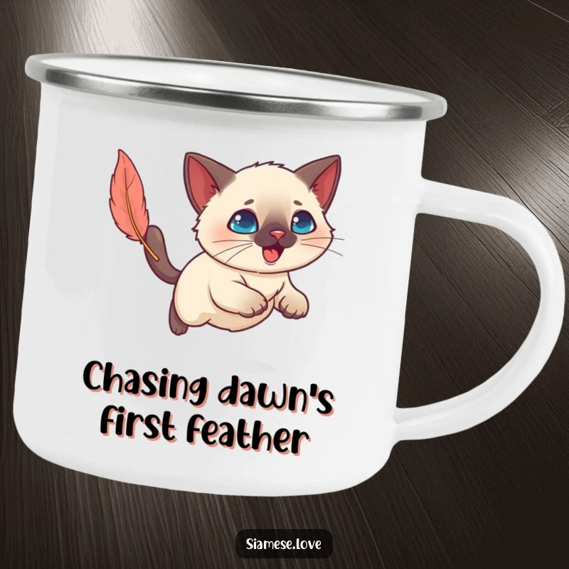 Funny Kawaii Siamese cat chasing a feather toy, perfect for an enamel camping mug, bringing outdoor fun.