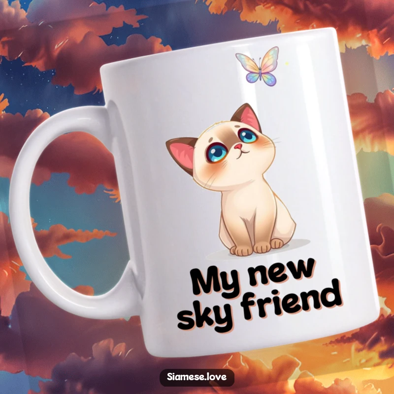 Funny Siamese Cat Mug: Adorable feline gazing upwards in awe at a delicate, shimmering butterfly, perfect for cat enthusiasts.