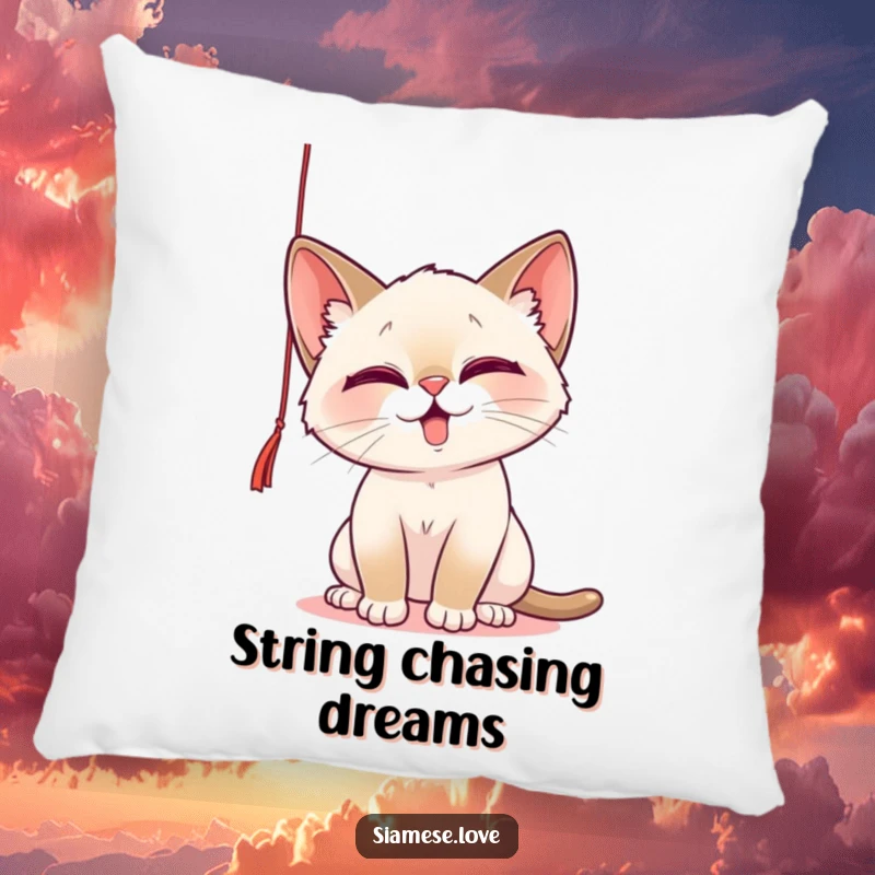 Funny Pillow with a playful Siamese cat batting at a string, offering cozy comfort and a heartwarming dose of feline humor.