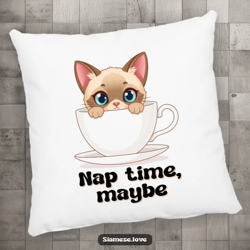 Funny pillow featuring a curious Siamese cat peeking from behind a giant teacup, adding comfort and feline charm.