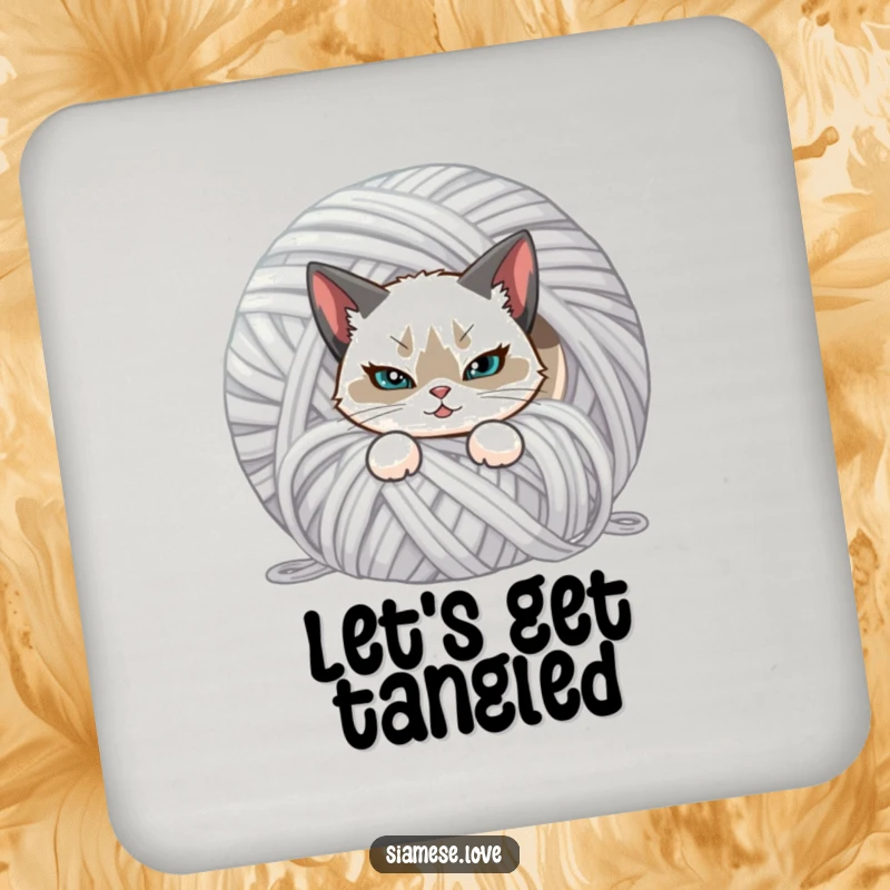 Funny drink coaster featuring a Siamese cat with a mischievous smirk, hiding behind yarn. Protects surfaces with humor.