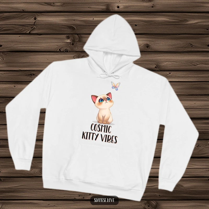Funny Siamese Cat Hoodie: Soft, warm apparel featuring a cat captivated by a sparkling butterfly, ideal for cozy, magical moments.
