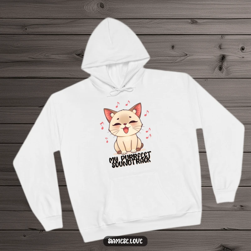 Funny hooded sweatshirt, a content Siamese cat character purring loudly, surrounded by floating musical notes, offering cozy melodic humor.