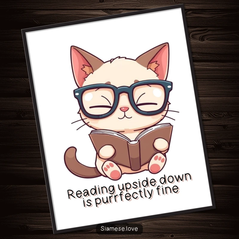 Funny Free Printable Wall Art: A Siamese cat wearing oversized glasses reads a book held upside down.