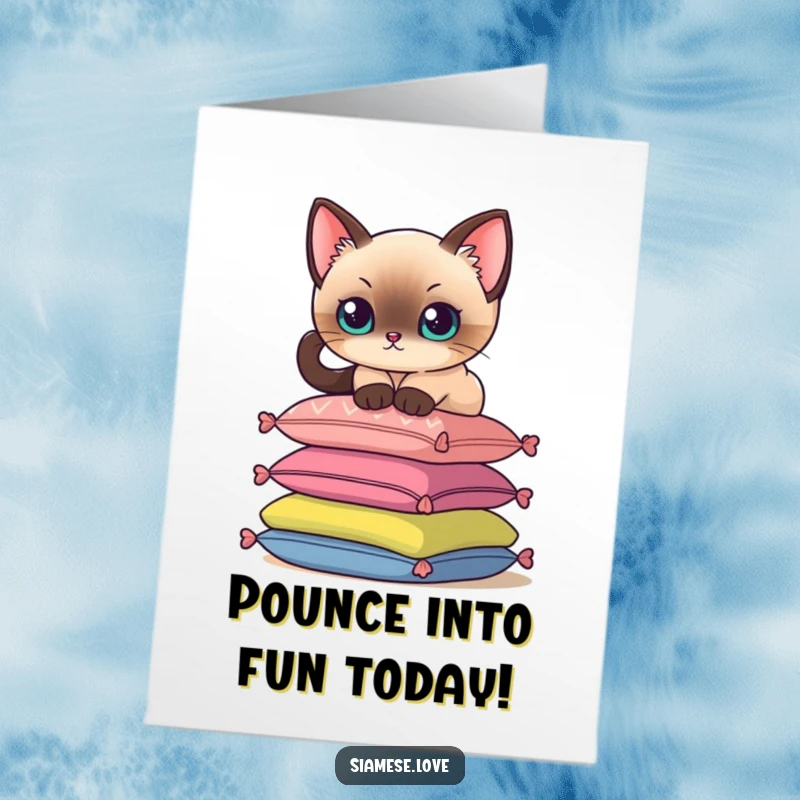 Funny Free Printable Birthday Card: A Siamese cat delicately perches on a stack of colorful cushions, celebrating in style.