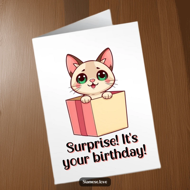 Funny Free Printable Birthday Card: Siamese cat pops out of a gift box with a playful surprise, ready for birthday fun.