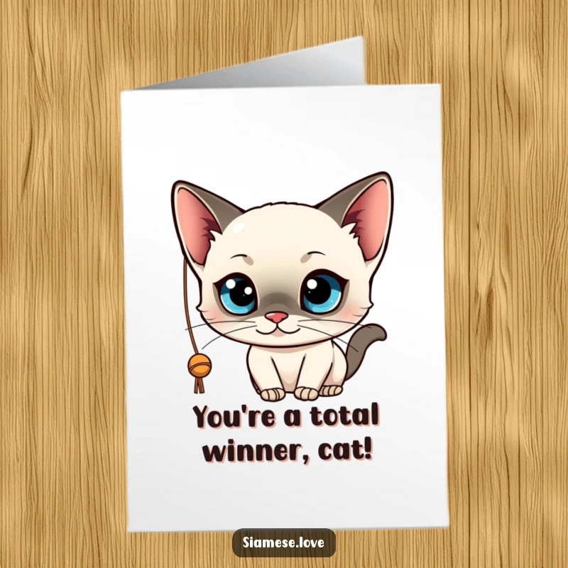 Funny Free Printable Congrats Card: A sleek Siamese cat with big blue eyes playfully batting a string, celebrating success.