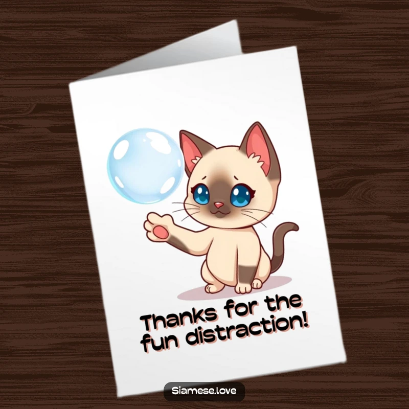 Funny Free Printable Thank You Card: Curious Siamese cat batting a floating bubble, full of playful curiosity.