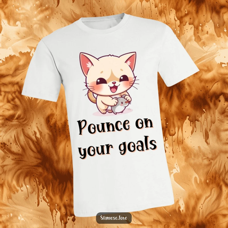 Funny kawaii Siamese cat gleefully pouncing on a tiny mouse toy on a t-shirt, full of action.