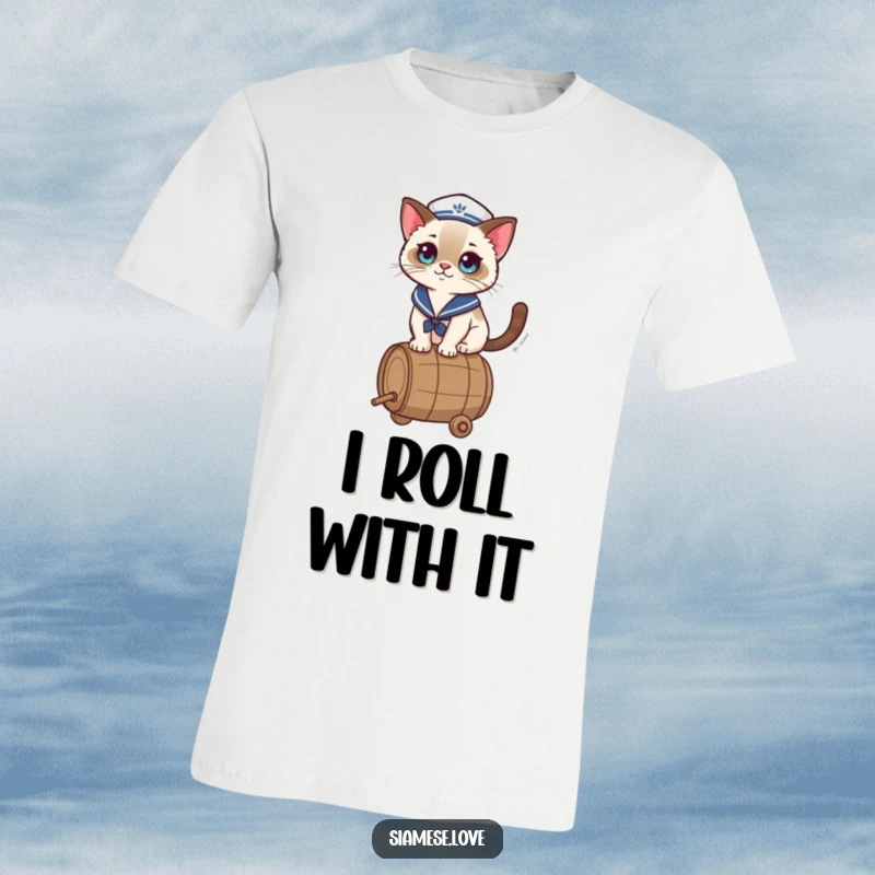 Funny T-Shirt showcasing a kawaii Siamese cat wearing a sailor hat, artfully balancing on a rolling barrel, exuding playful charm.