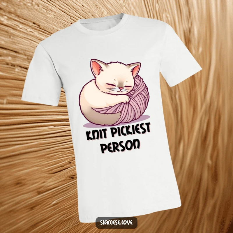 Funny Siamese cat t-shirt, a happy cat is nestled comfortably within a big ball of yarn, exuding peace.